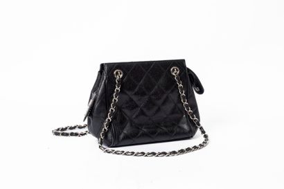 CHANEL
Mini tote in black caviar grain calfskin,...