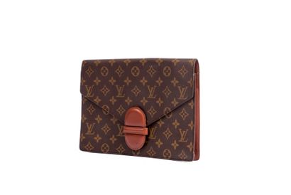 LOUIS VUITTON
Clutch bag in monogram canvas...