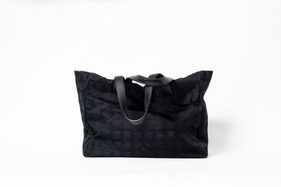 CHANEL
Shopping bag in black damask nylon....