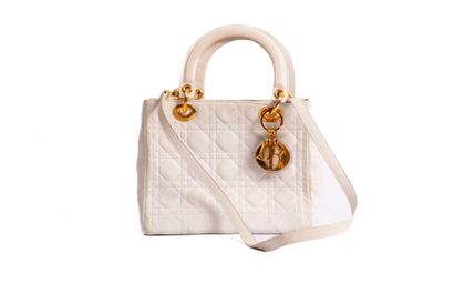 CHRISTIAN DIOR
Lady Dior bag in white quilted...