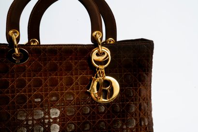 DIOR
Lady Dior bag in brown quilted nylon....