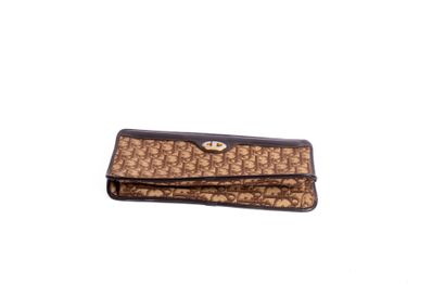 CHRISTIAN DIOR
Brown slanted canvas clutch...