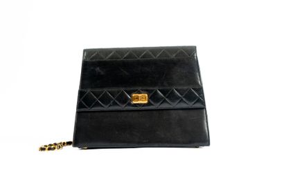 CHANEL
Trapezoid-shaped flap bag in partially...