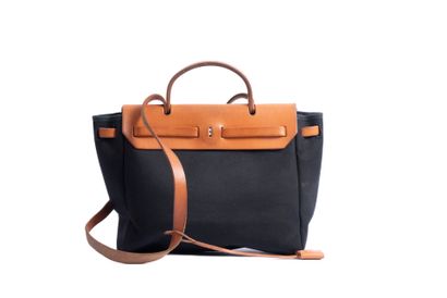 HERMES
Herbag in black canvas and natural...