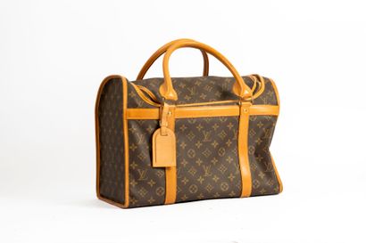 LOUIS VUITTON
Cat-dog bag in monogram canvas...