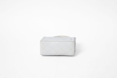 CHANEL
Handbag with flap in white quilted...