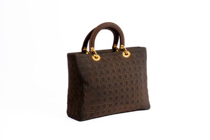 DIOR
Lady Dior bag in brown quilted nylon....