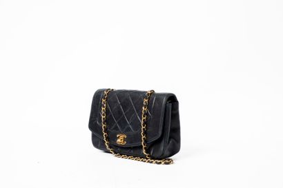 CHANEL 
Diana bag in black quilted lambskin...