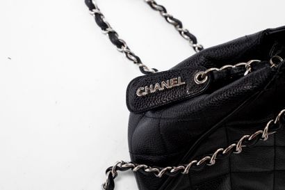 CHANEL
Mini tote in black caviar grain calfskin,...
