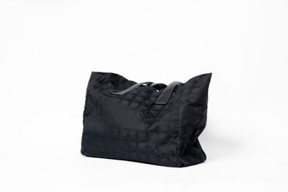 CHANEL
Shopping bag in black damask nylon....
