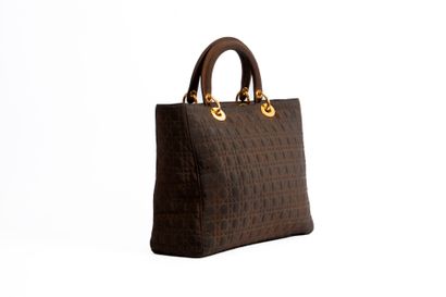 DIOR
Lady Dior bag in brown quilted nylon....