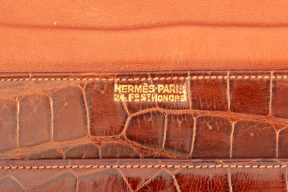 HERMES Paris. 
Brown crocodile clutch bag...