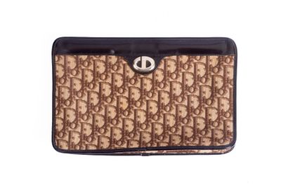CHRISTIAN DIOR
Brown slanted canvas clutch...