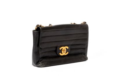CHANEL
Classic Jumbo bag in black caviar...