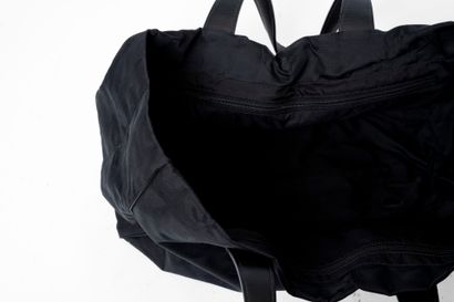 CHANEL
Shopping bag in black damask nylon....