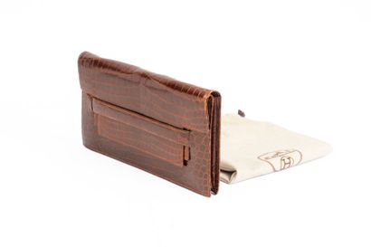 HERMES Paris. 
Brown crocodile clutch bag...