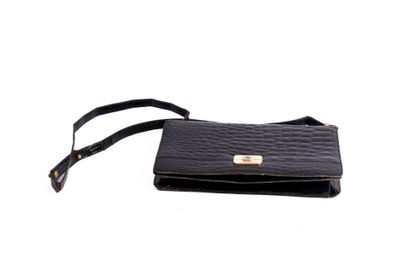 CHRISTIAN DIOR
Black crocodile clutch bag,...