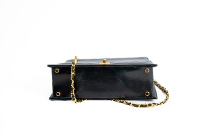 CHANEL
Trapezoid-shaped flap bag in partially...