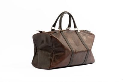 CHRISTIAN DIOR
Brown embossed leather bag....