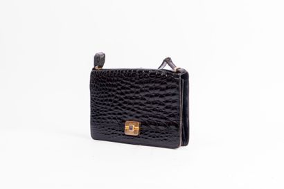 CHRISTIAN DIOR
Black crocodile clutch bag,...