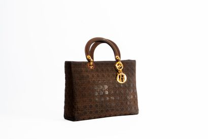 DIOR
Lady Dior bag in brown quilted nylon....