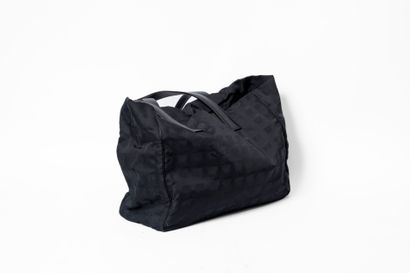 CHANEL
Shopping bag in black damask nylon....