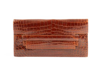 HERMES Paris. 
Brown crocodile clutch bag...