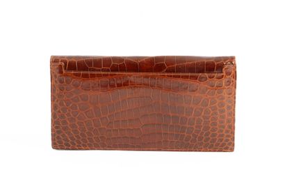 HERMES Paris. 
Brown crocodile clutch bag...