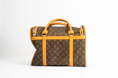 LOUIS VUITTON
Cat-dog bag in monogram canvas...