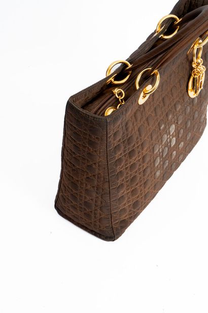 DIOR
Lady Dior bag in brown quilted nylon....