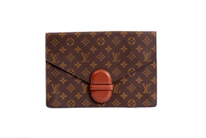 LOUIS VUITTON
Clutch bag in monogram canvas...
