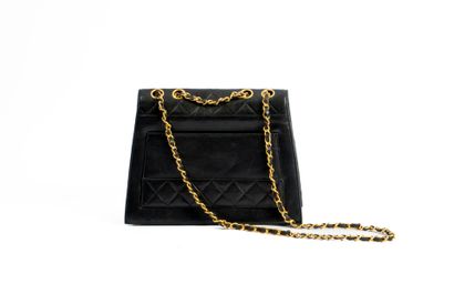 CHANEL
Trapezoid-shaped flap bag in partially...