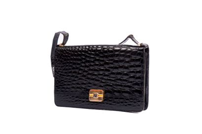 CHRISTIAN DIOR
Black crocodile clutch bag,...