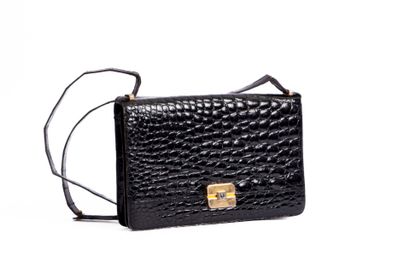 CHRISTIAN DIOR
Black crocodile clutch bag,...