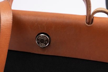 HERMES
Herbag in black canvas and natural...