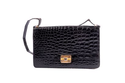 CHRISTIAN DIOR
Black crocodile clutch bag,...