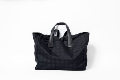 CHANEL
Shopping bag in black damask nylon....