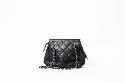 CHANEL
Mini tote in black caviar grain calfskin,...