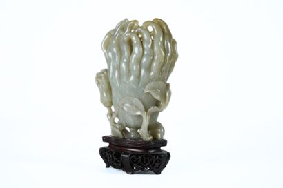 CHINA, 20th century
Carved celadon jade subject...