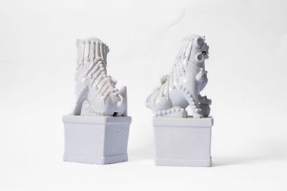 CHINA, 20th century
Pair of white enameled...