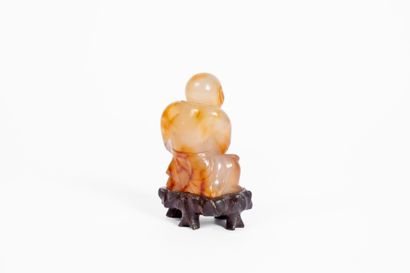 CHINA, 20th century
Carved agate subject...