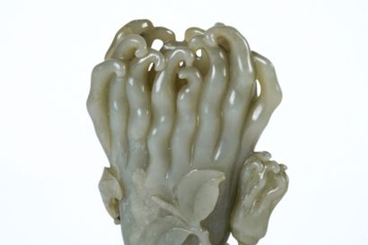 CHINA, 20th century
Carved celadon jade subject...