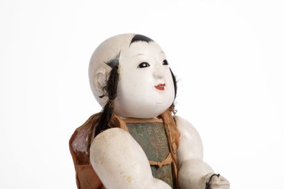 CHINA, 19th century
Composition doll, embroidered...