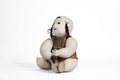 CHINA, 19th century
Composition doll, embroidered...