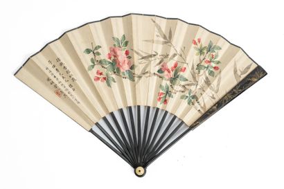 Fourteen-strand paper fan in black lacquered...