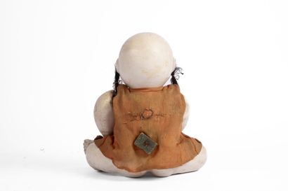 CHINA, 19th century
Composition doll, embroidered...