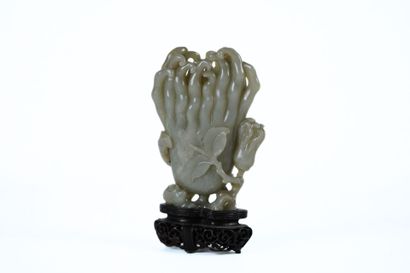 CHINA, 20th century
Carved celadon jade subject...