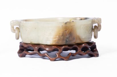 CHINA, 20th century
Four-lobed jade bowl...