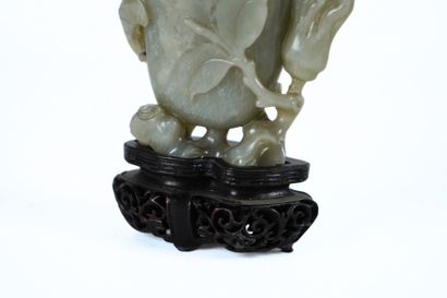 CHINA, 20th century
Carved celadon jade subject...