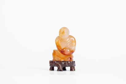CHINA, 20th century
Carved agate subject...